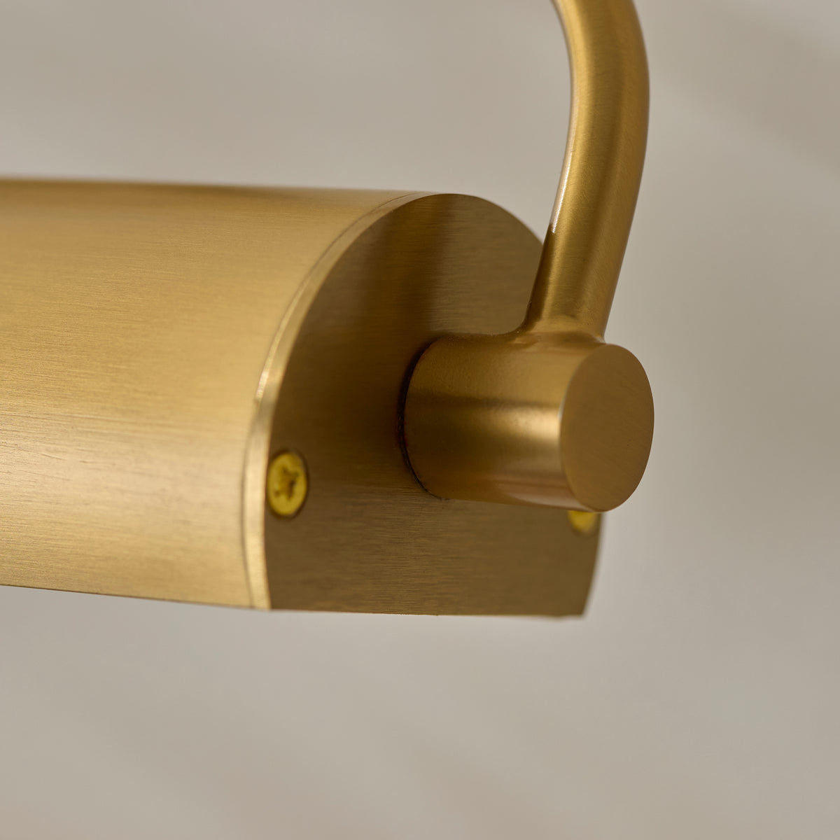 End detail of the cylindrical brass shade and pivot fixing on the Nantes picture light