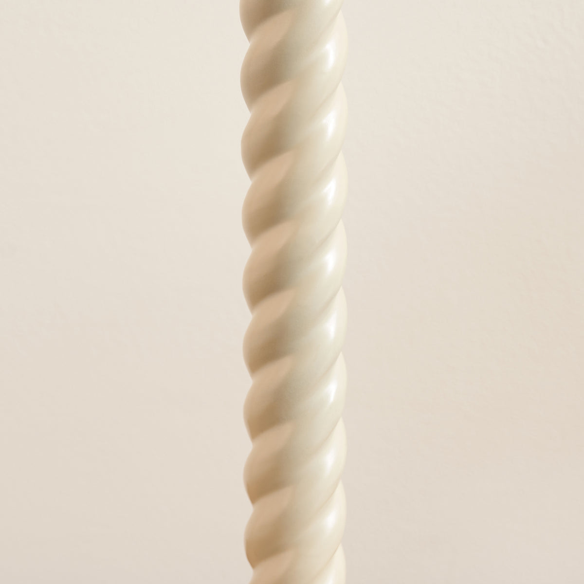 Spiralled satin almond white stem of the Twist table lamp base in close detail
