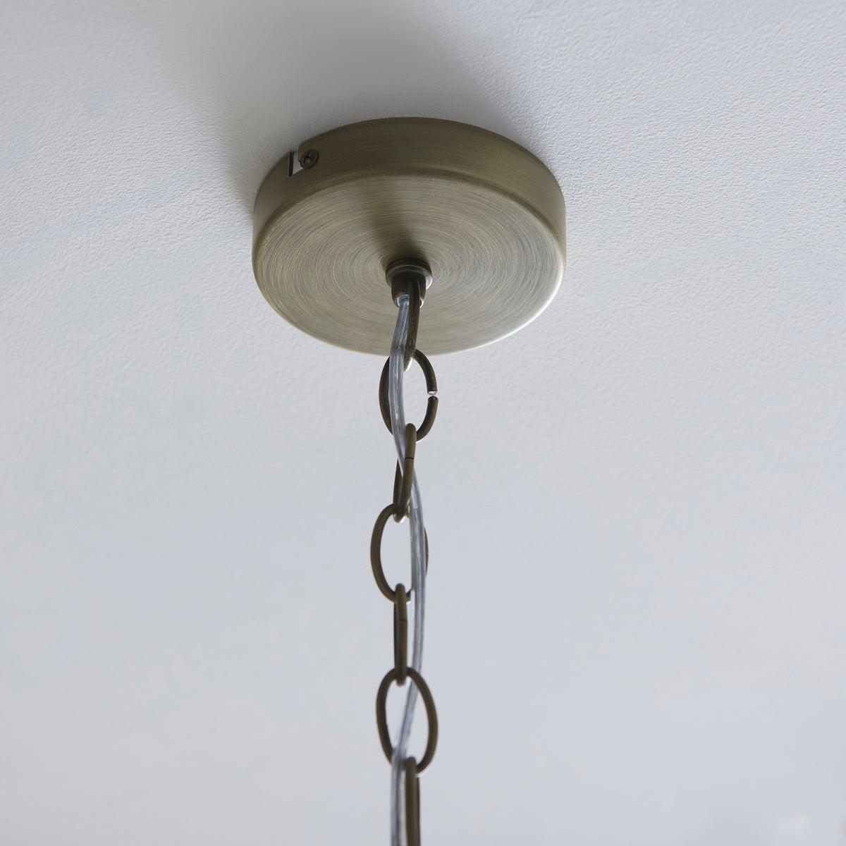 Antique brass ceiling rose and chain suspension of the Lucille chandelier