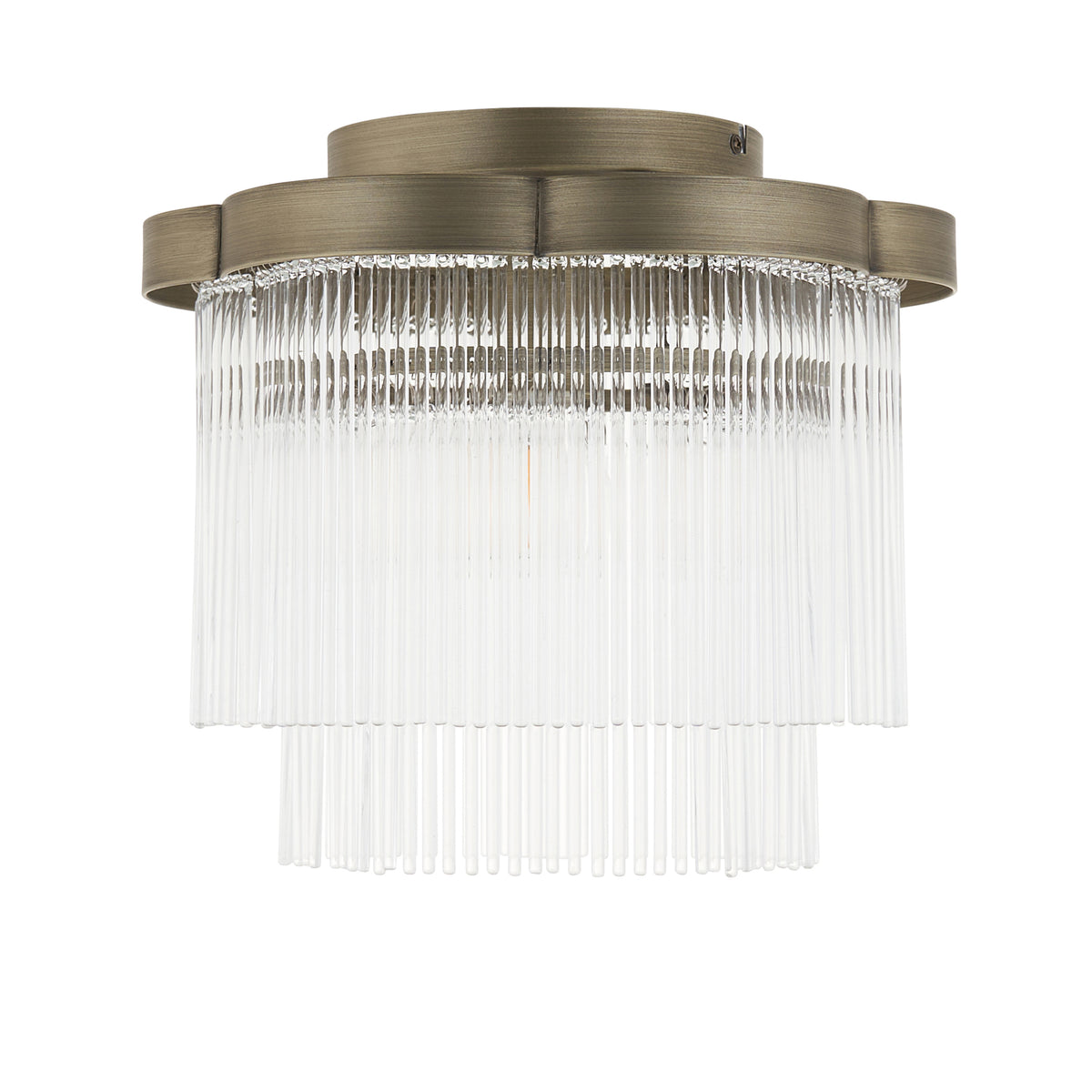 Lucille antique brass flush ceiling light shown lit against a plain white background