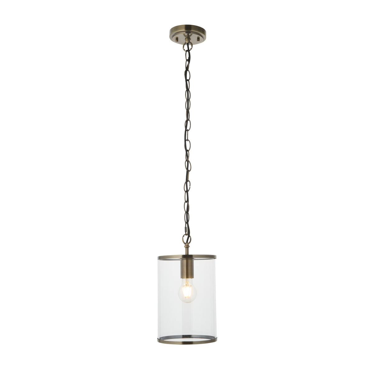 Hebden brass pendant lighting a sage green hallway with panelled front door and oval mirror