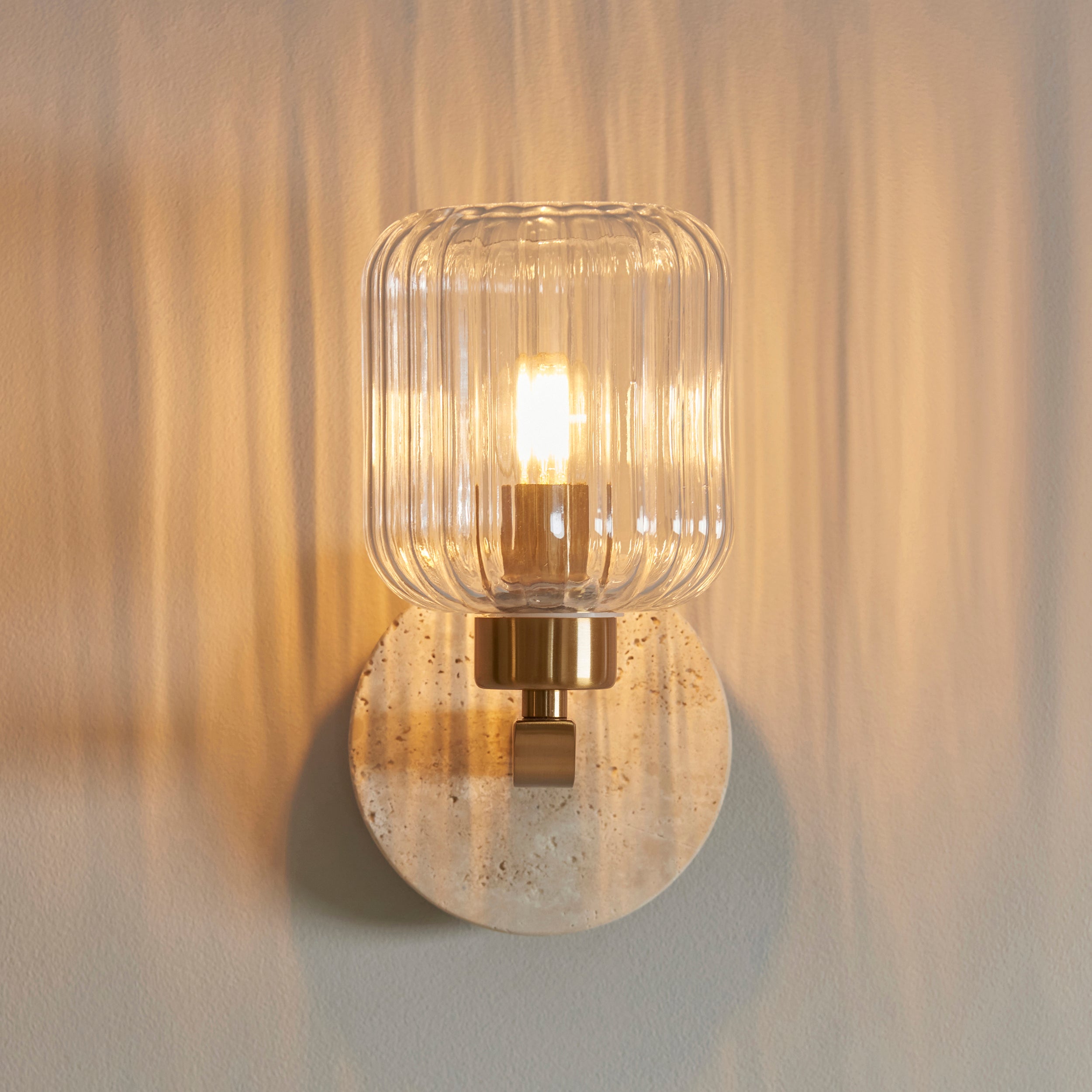 Travi Travertine Stone & Brass Wall Light - Glass Ribbed Shade