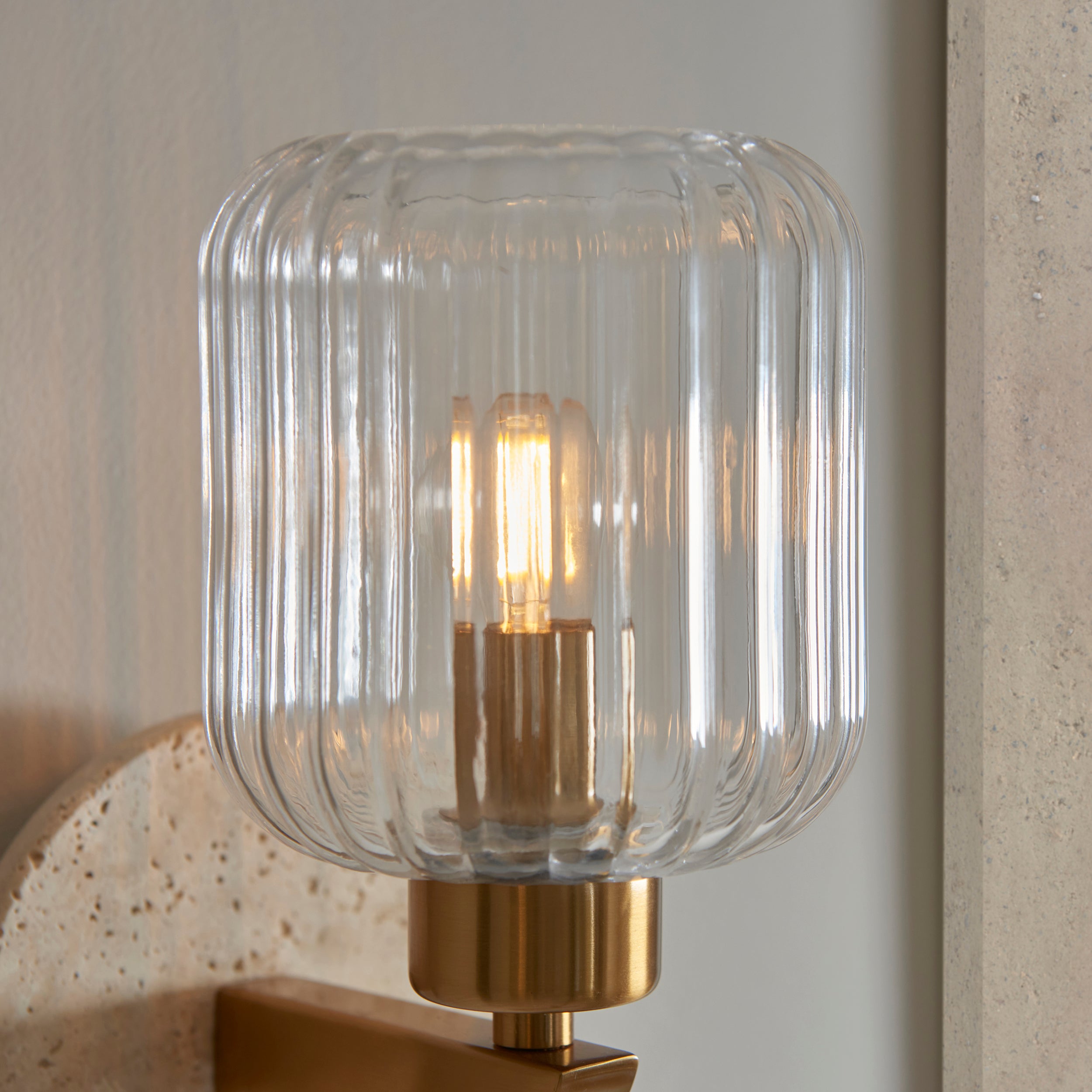 Travi Travertine Stone & Brass Wall Light - Glass Ribbed Shade