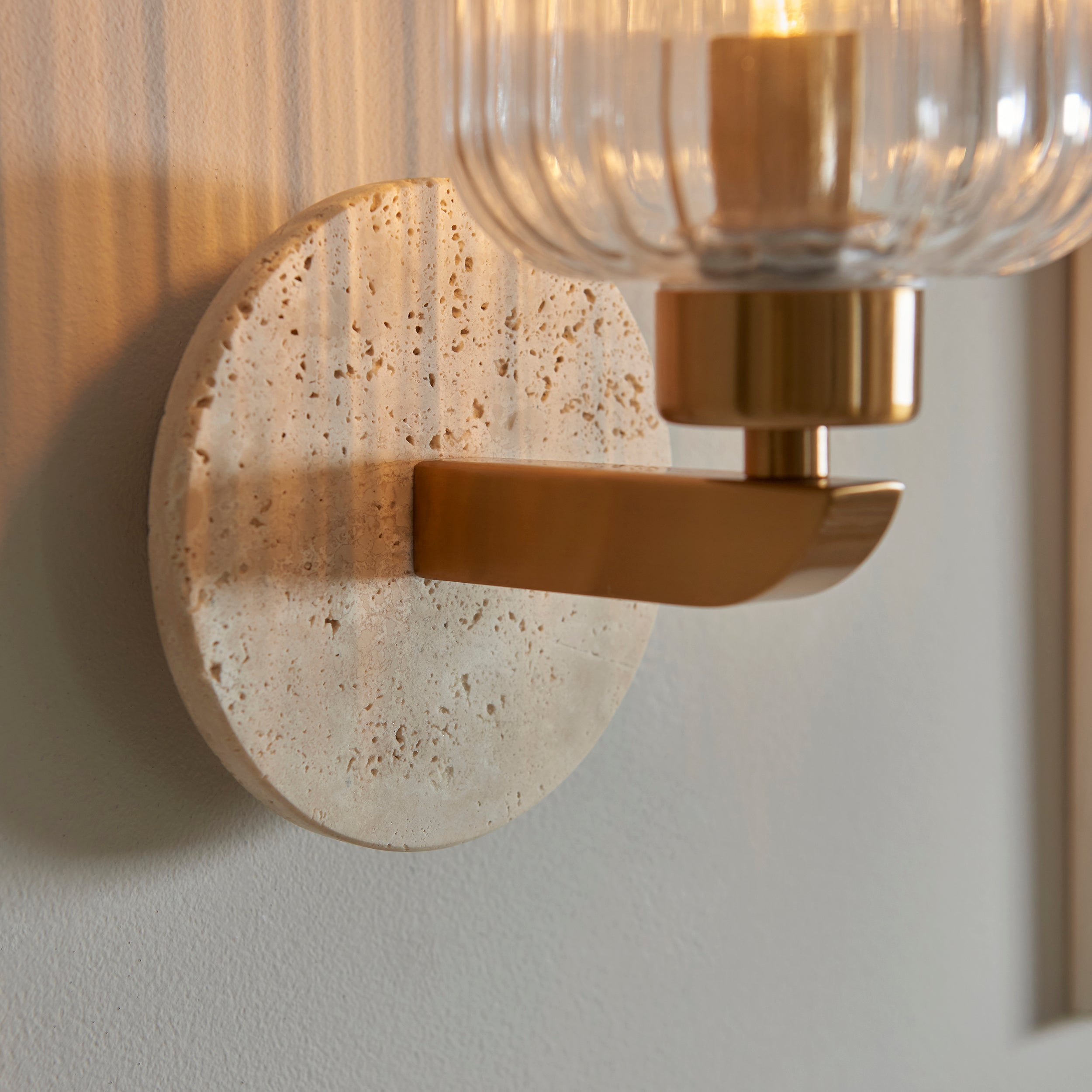 Travi Travertine Stone & Brass Wall Light - Glass Ribbed Shade