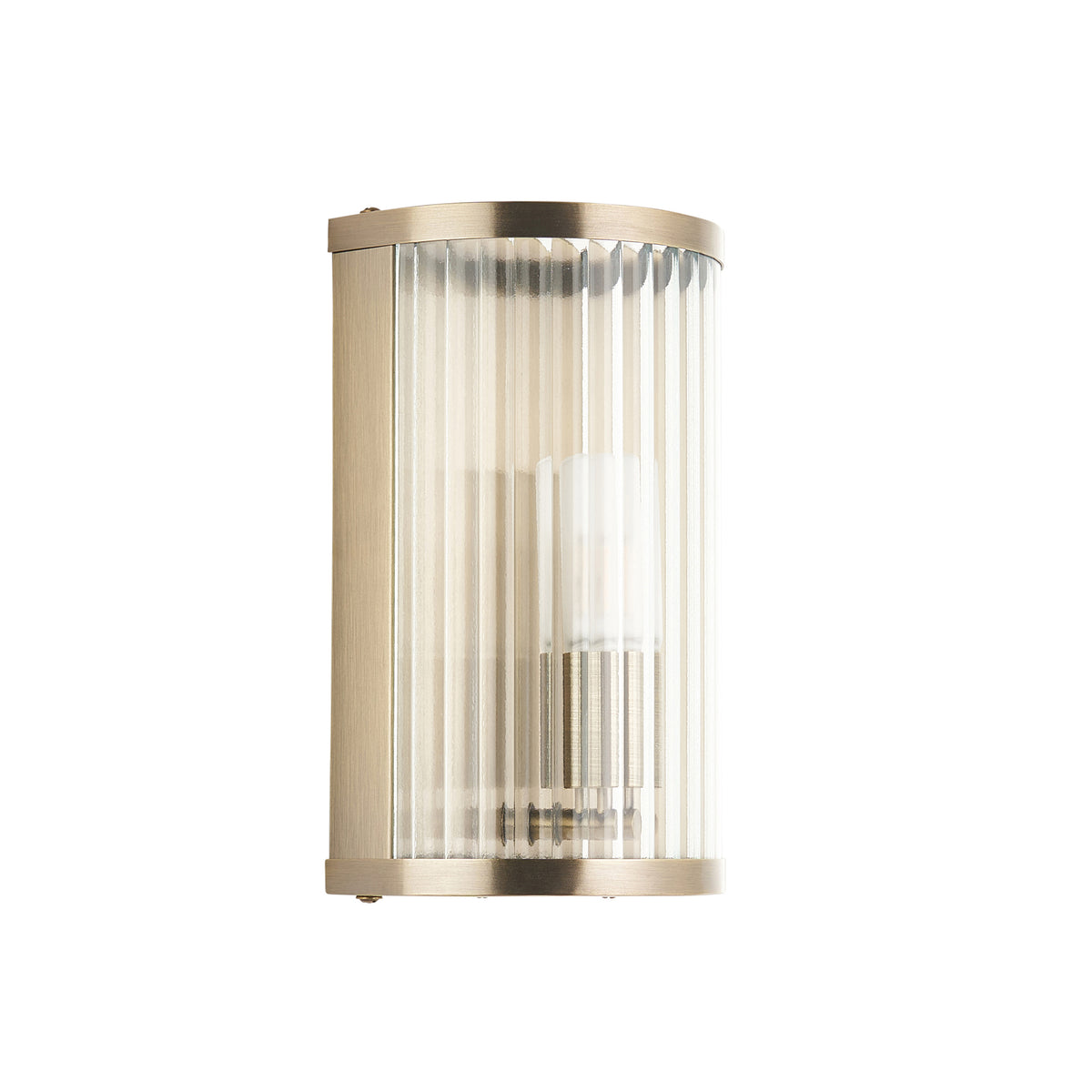Ridgeton antique brass IP44 wall light with ribbed glass shade shown against plain white