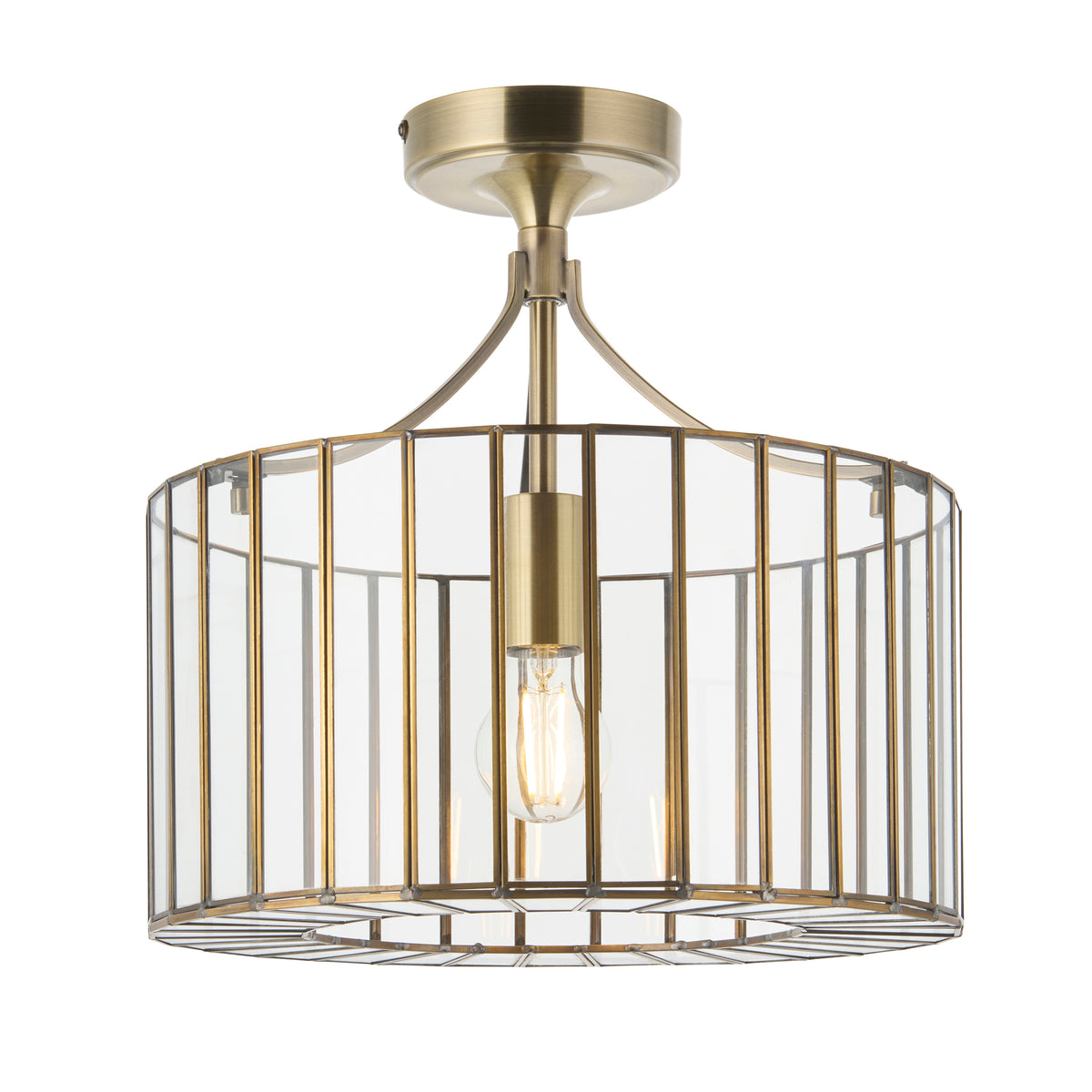 Antalya antique brass flush ceiling light with clear glass cage shade and single filament bulb