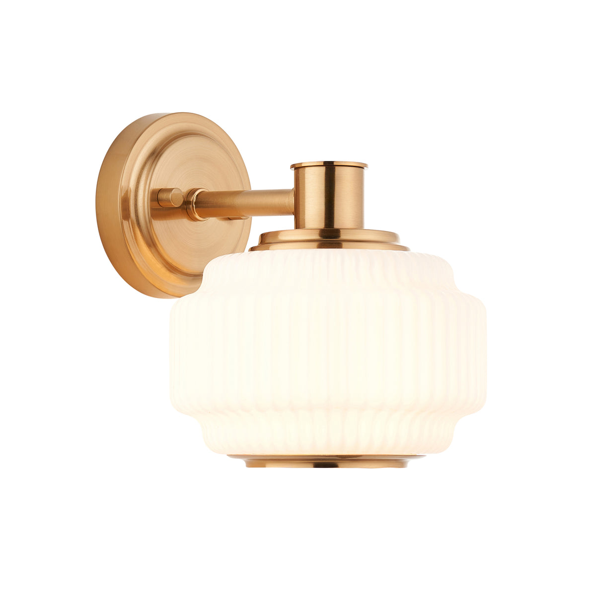 Evora brushed brass wall light with stepped opal ribbed glass shade on a round backplate