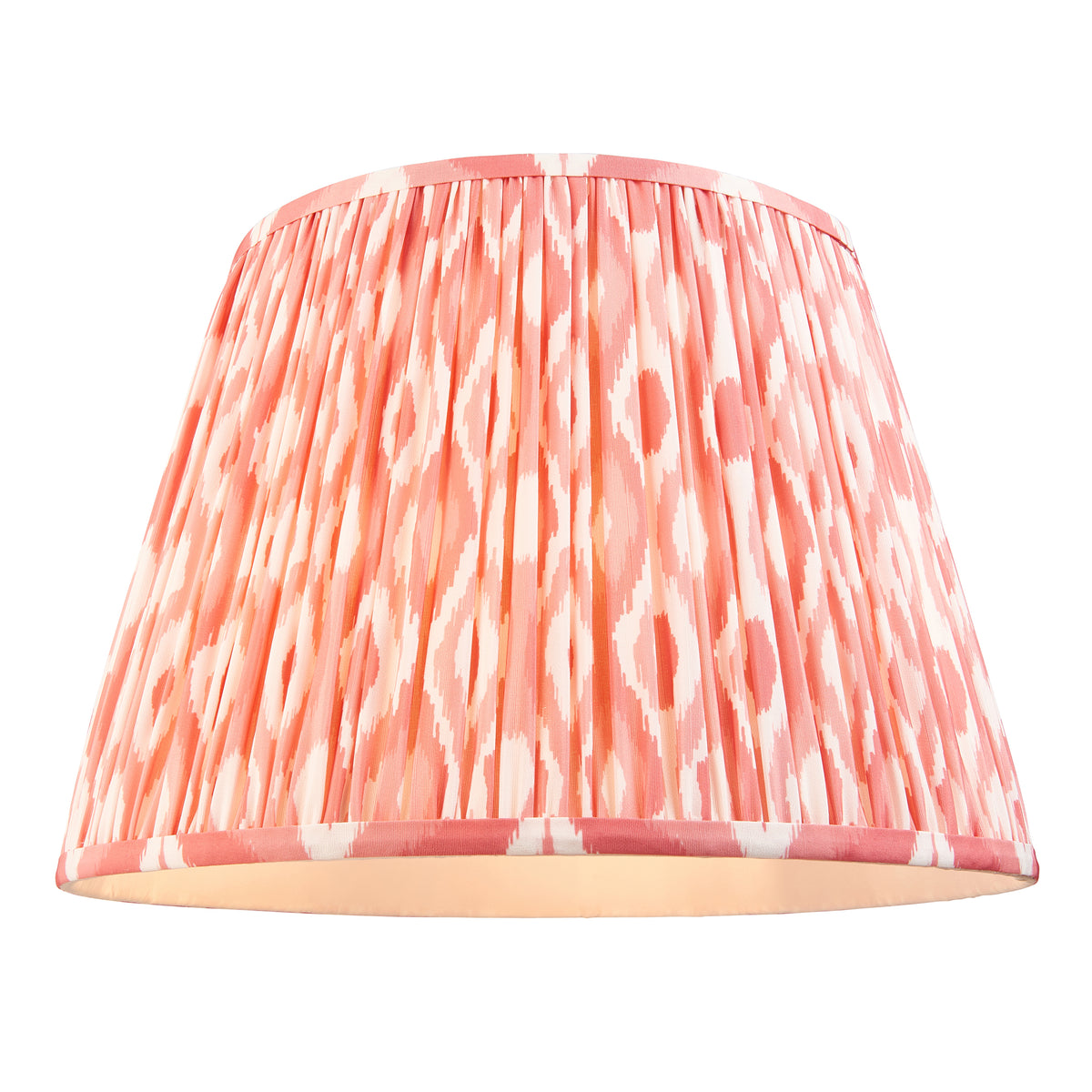 Pleated coral pink ikat empire lampshade shown alone on a white background