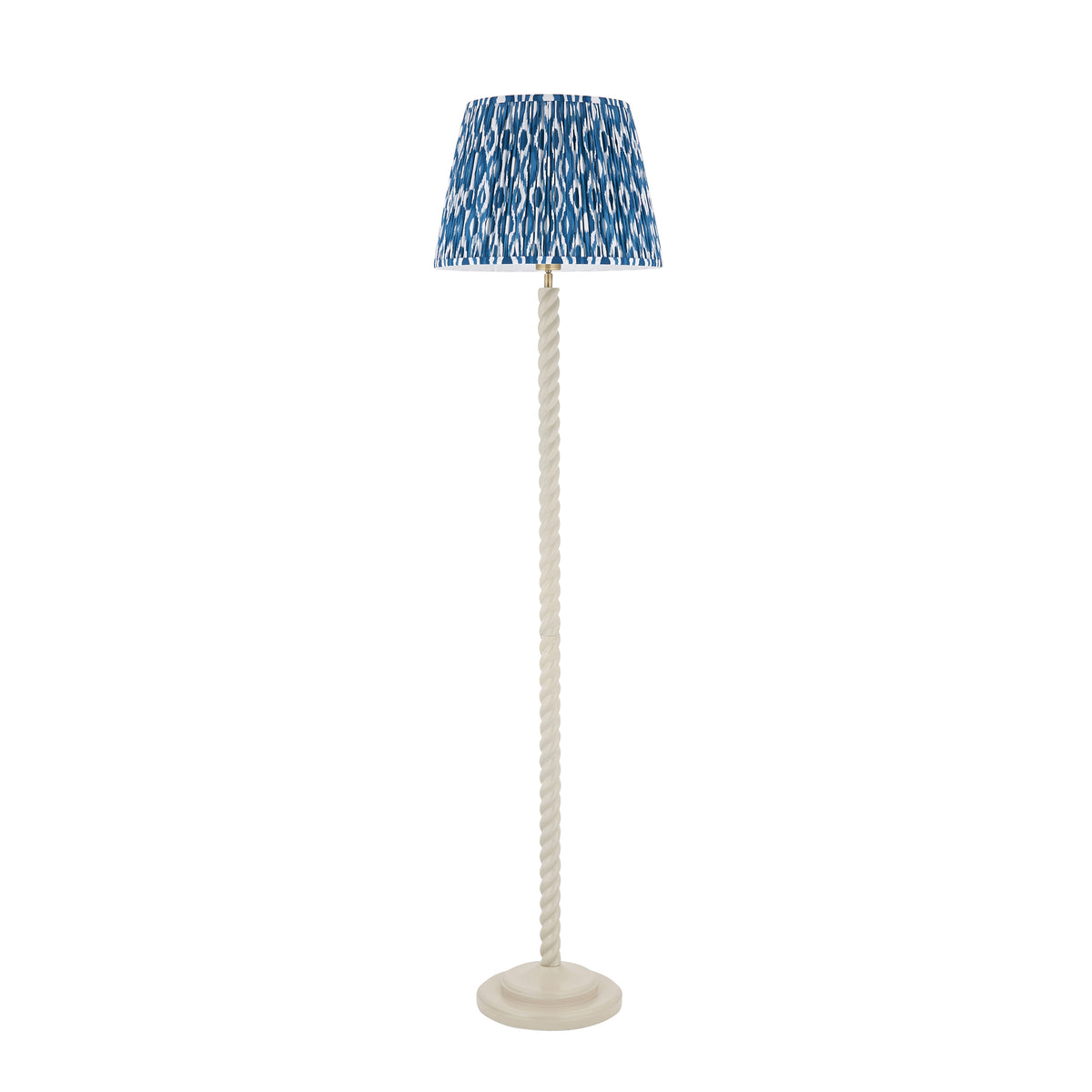 Full view of the Twist & Ikat almond white floor lamp with blue ikat pleated shade