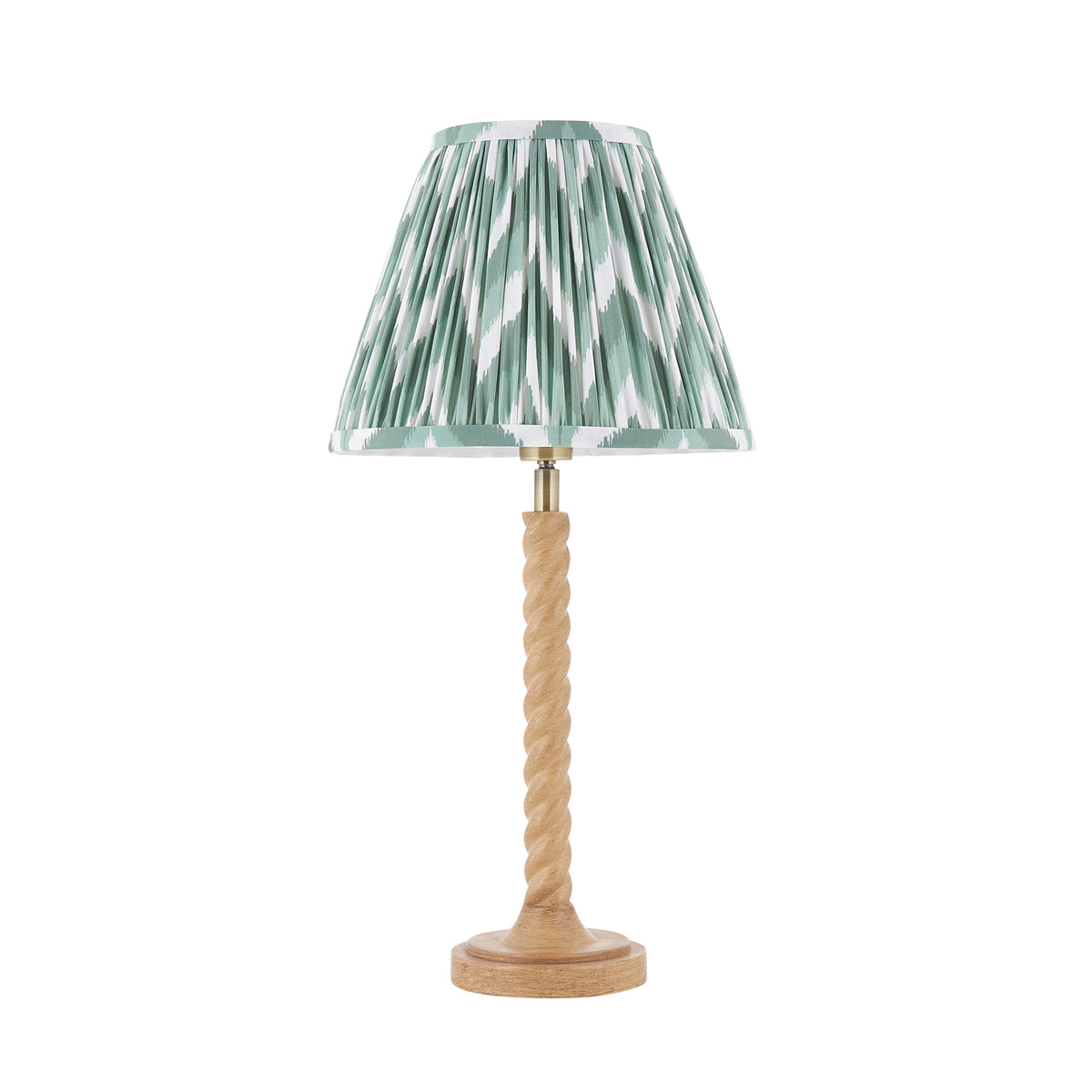 Twist & Zigzag oak effect table lamp shown with its green zigzag pleated shade