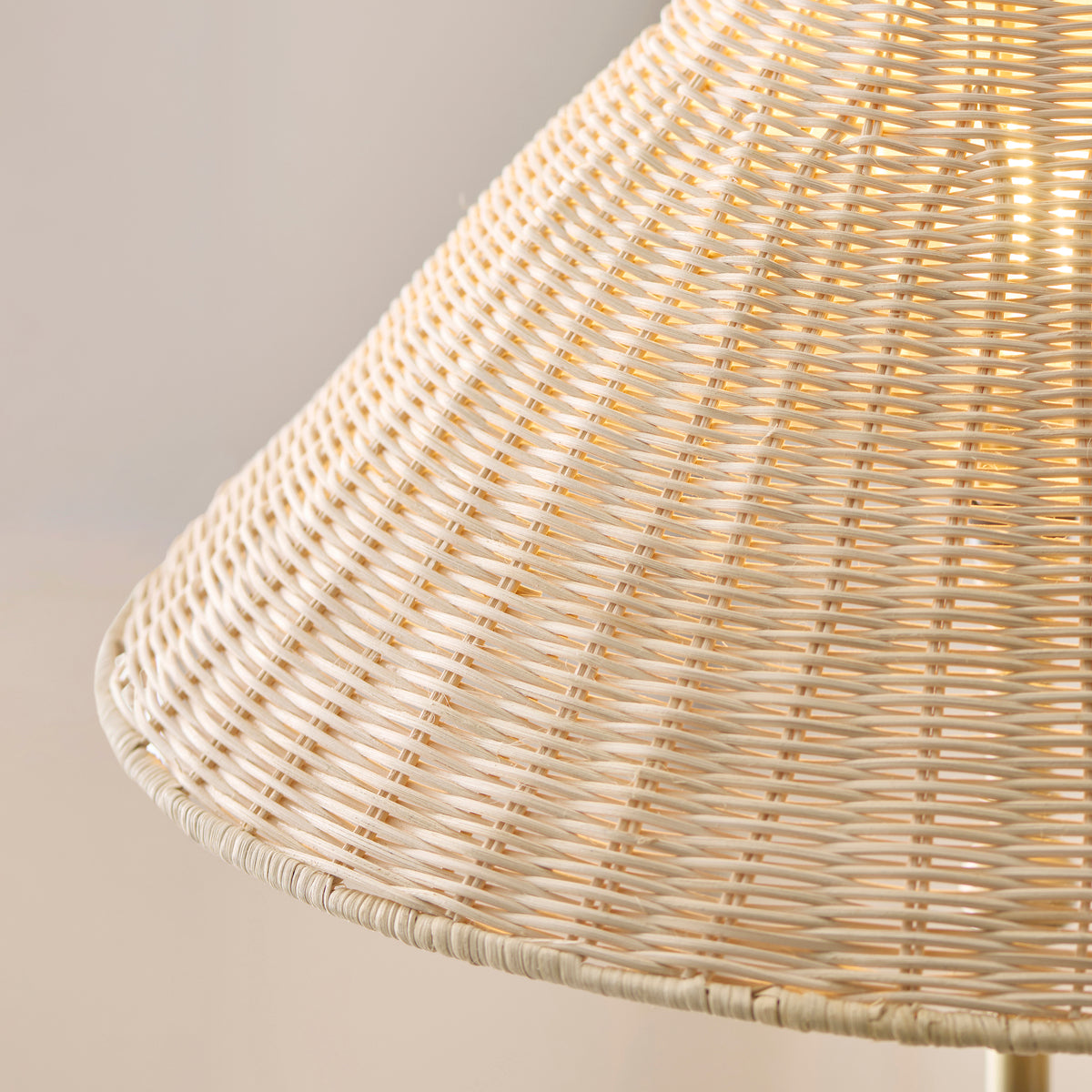 Detail of the natural rattan weave on the Arlo lamp shade, showing its tapered basketwork texture