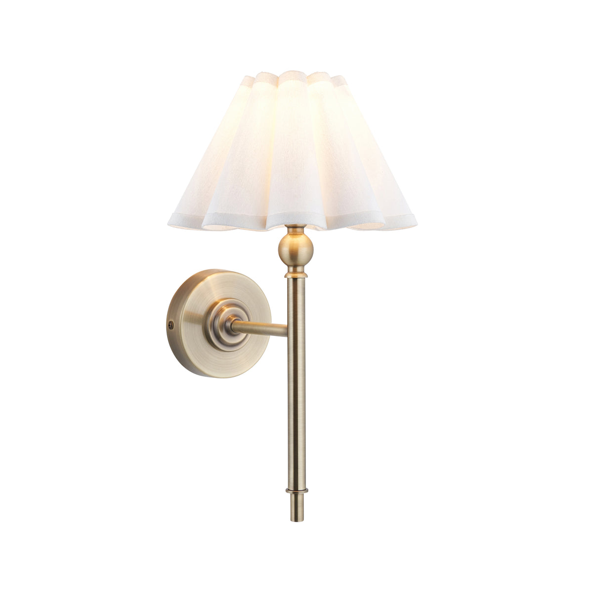 Sylvie wall light in antique brass with a white scalloped fabric shade on a plain background