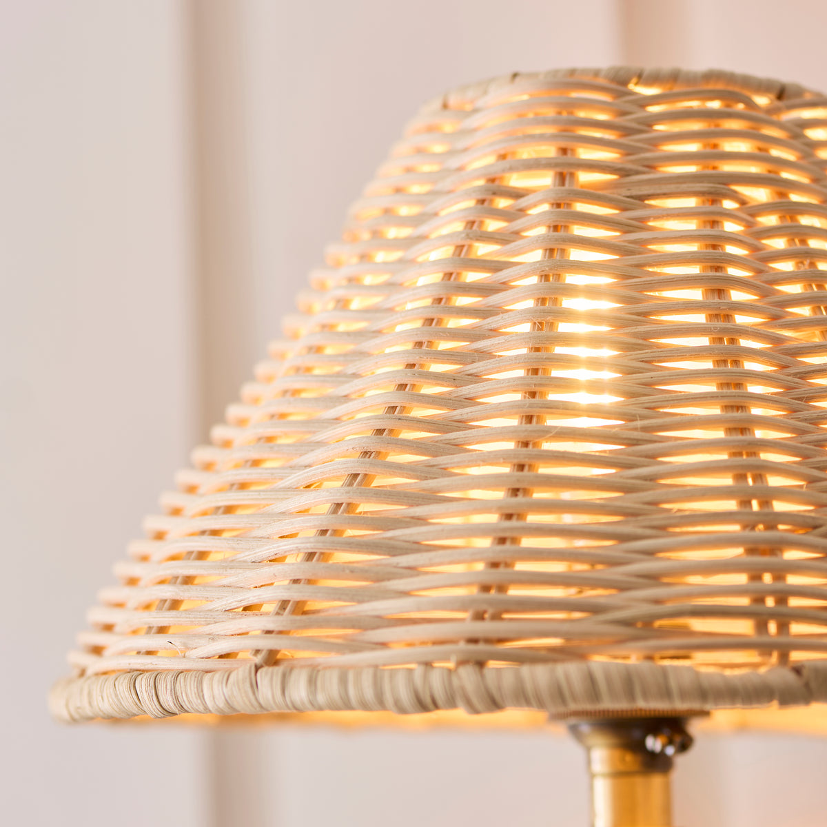 Macro detail of the pale rattan weave on the Jericho wall light shade