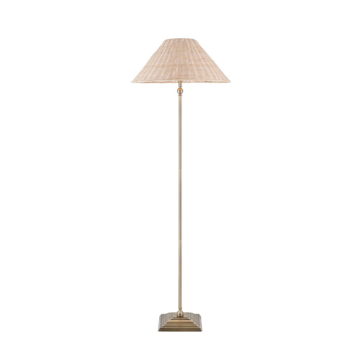 Jericho antique brass floor lamp shown full length with natural rattan coolie shade