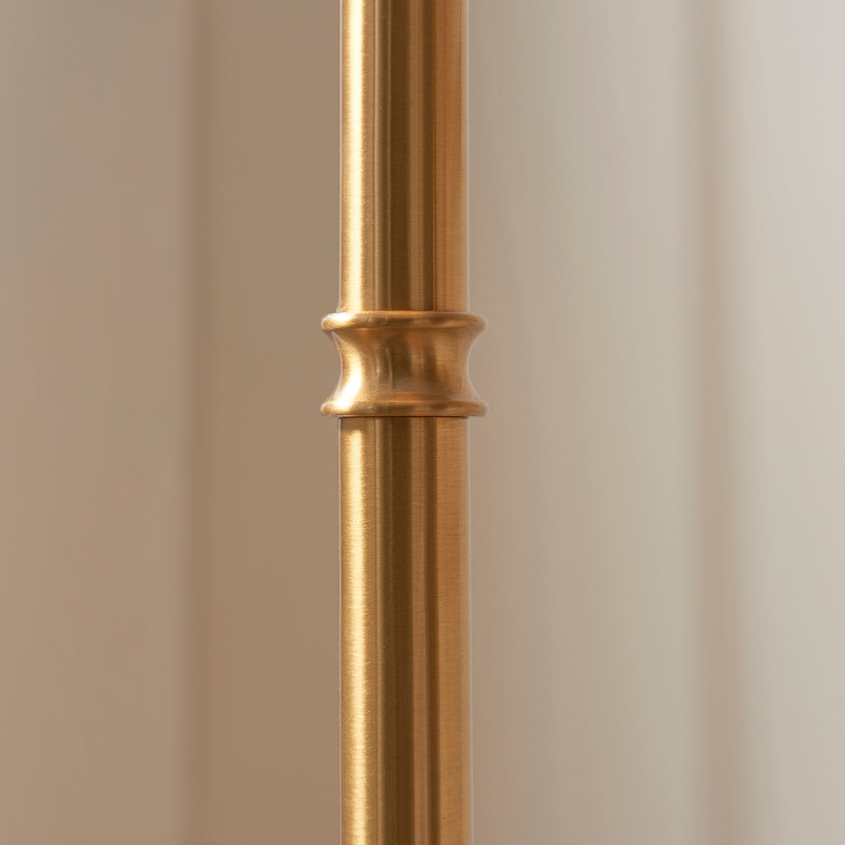 Detail of the ribbed aged brass collar on the Burley floor lamp stem
