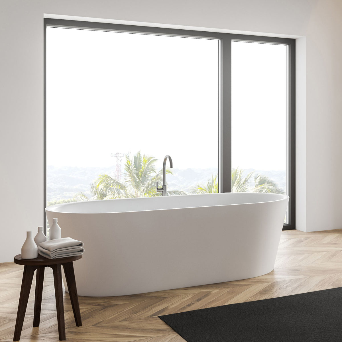 Airy bathroom with freestanding white bath, herringbone floor and stool suited to the Imperial light