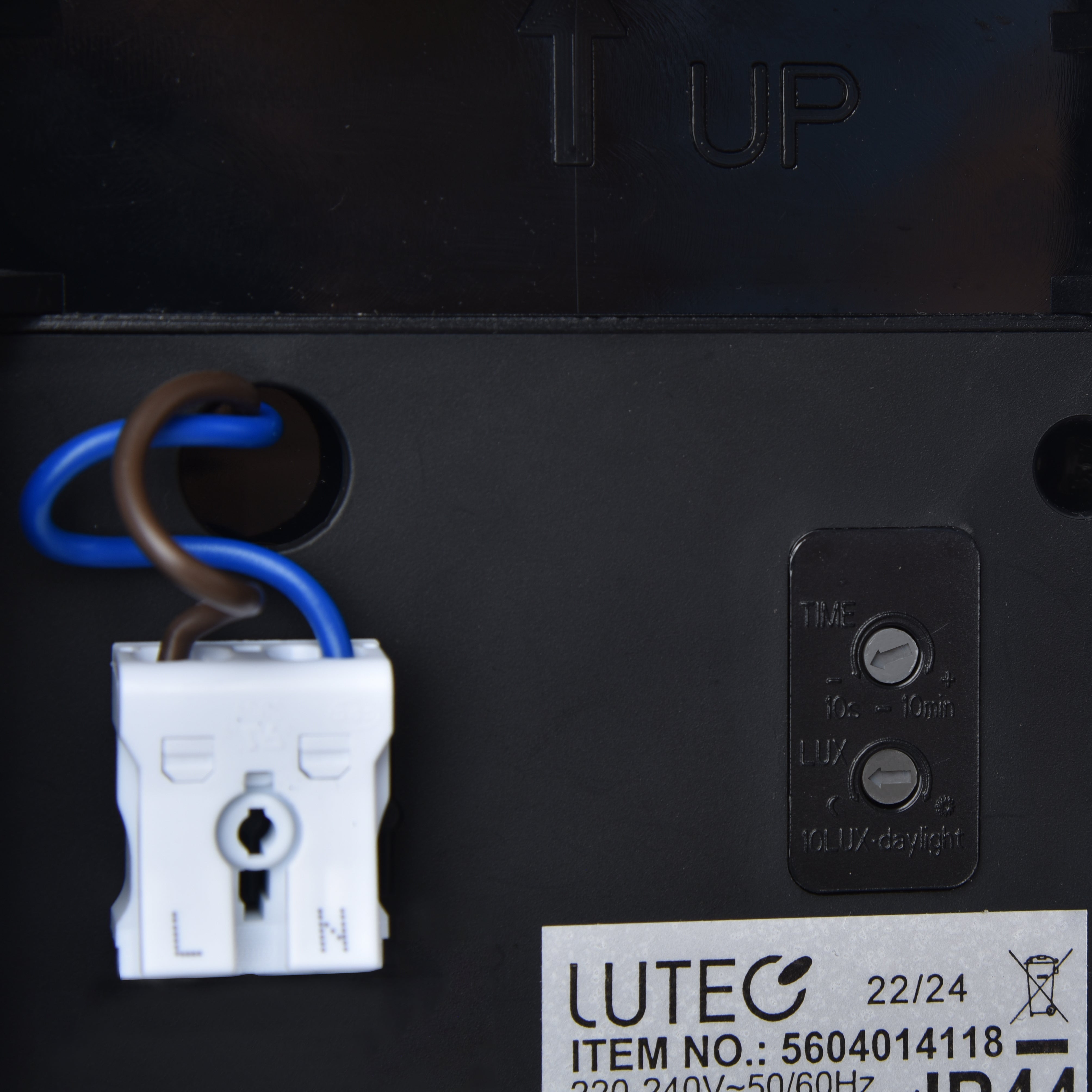 Electrical component with wiring and LUTEC label on a black background