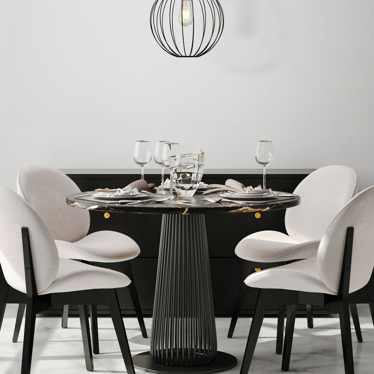 Rondo black wire globe pendant above a round dining table with pale pink velvet chairs
