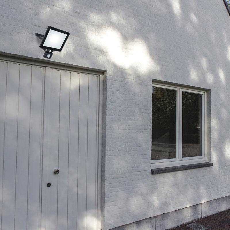 Lutec Tec30 PIR IP54 Integrated LED Flood Light - Black 7800906012 fixed above an outside door