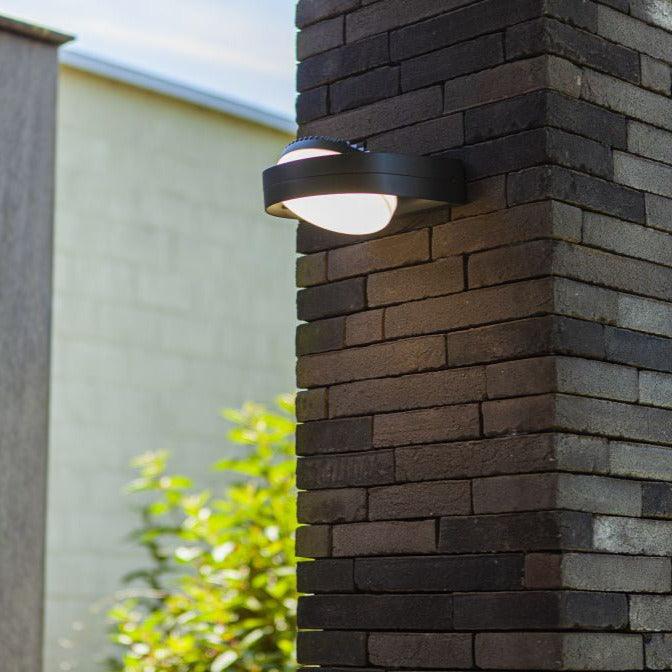 Lutec Fele Outdoor LED Wall Light In Dark Grey 5196301118 attached to an outdoor wall