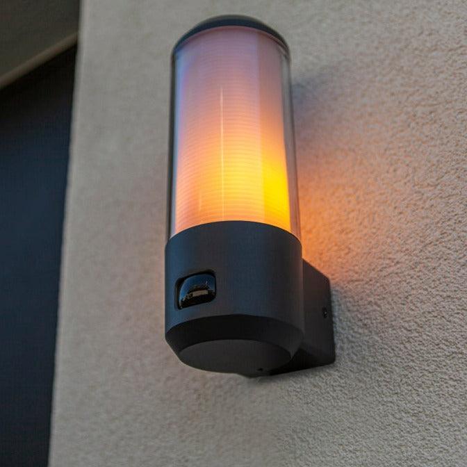Lutec Heros Motion Sensor Outdoor Wall Light - Dark Grey 5288202118 attached to an outdoor wall