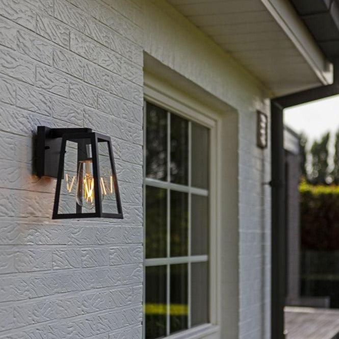 Lutec Fia Outdoor Wall Light Lantern In Matt Black 5290903012 fixed to an outside wall