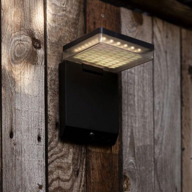 Lutec Moze Smart Solar Black LED Wall Light With PIR6943101012 