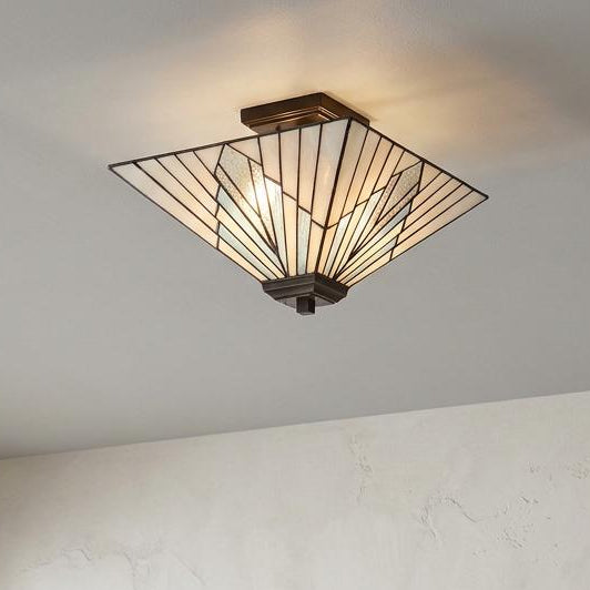 Alderley Tiffany ceiling light with an Art Deco pyramid shade mounted on a textured white ceiling.