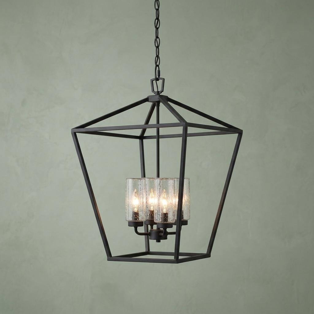 Black outdoor pendant light with a geometric open frame and four seeded glass candle-style lights.