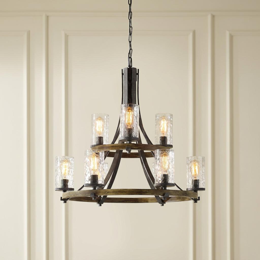 Rustic 8-light chandelier with wood hoops, black metal accents, and hammered glass shades on a cream paneled wall.