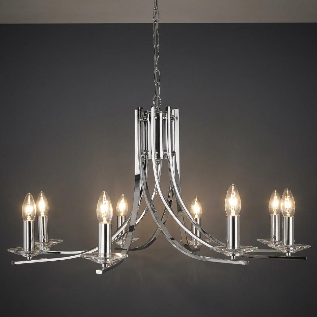 Eight-light chrome chandelier with curved arms and glass sconces, featuring candle-style bulbs against a dark wall.