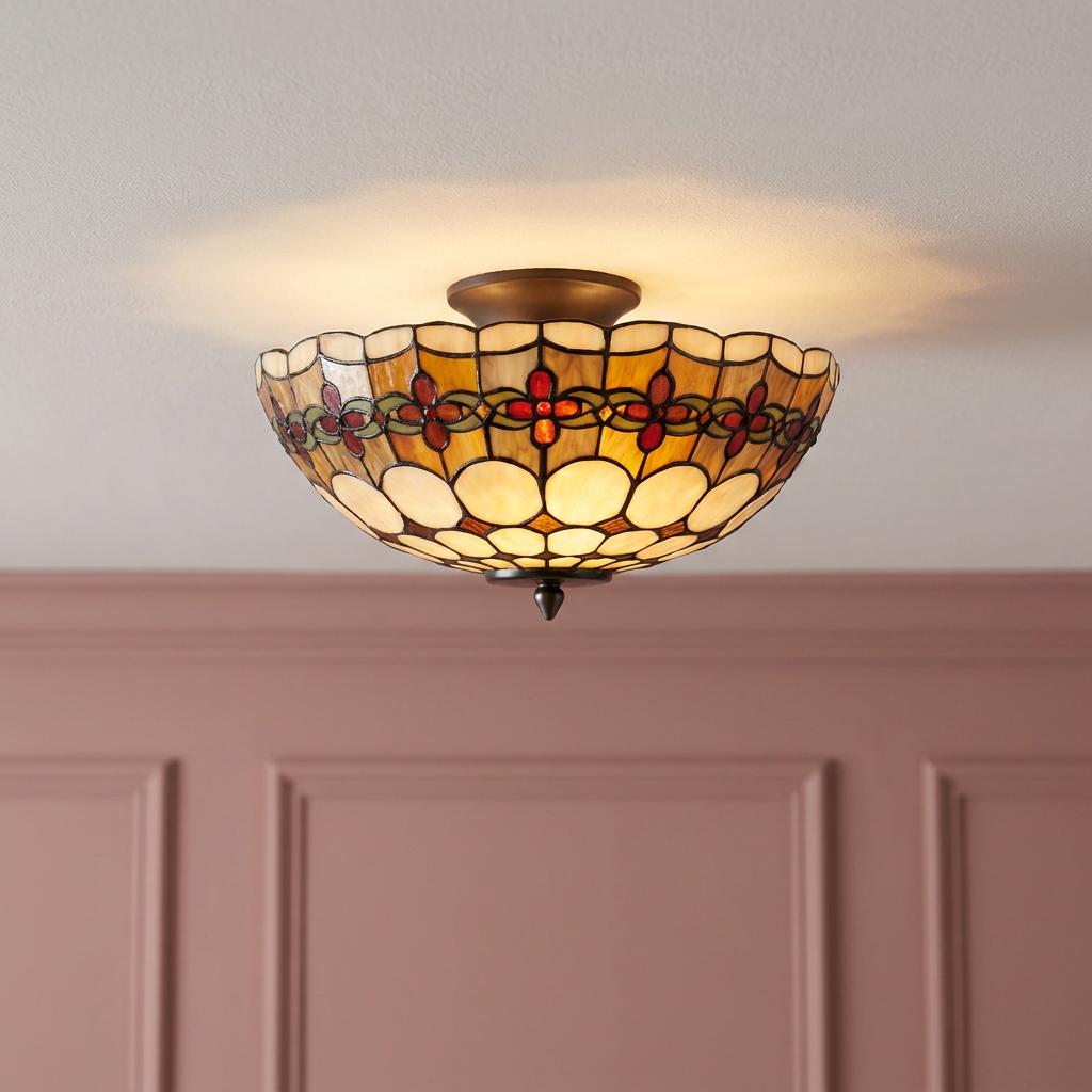 Semi-flush Tiffany ceiling light with a colorful stained glass floral shade mounted on a white ceiling.
