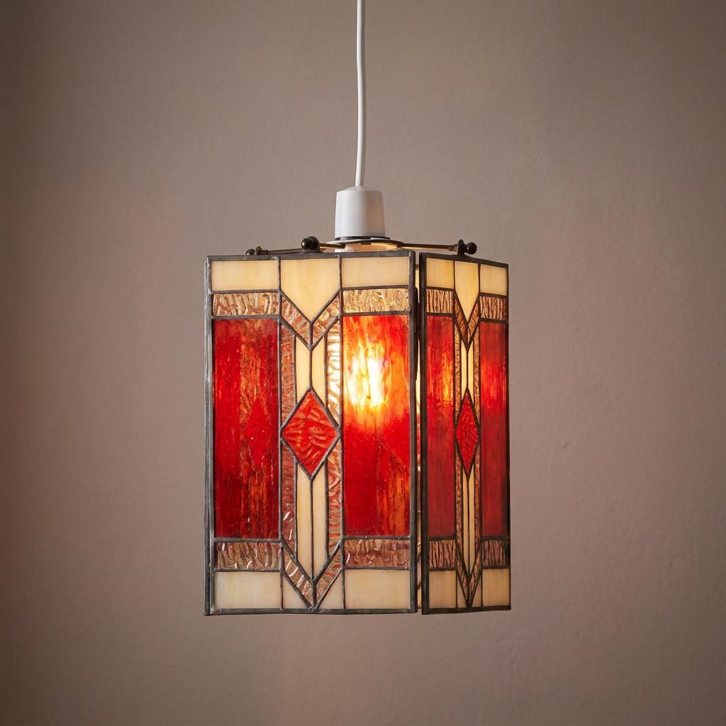 Square Tiffany-style ceiling lamp shade with red and cream stained glass in an Aztec geometric pattern.