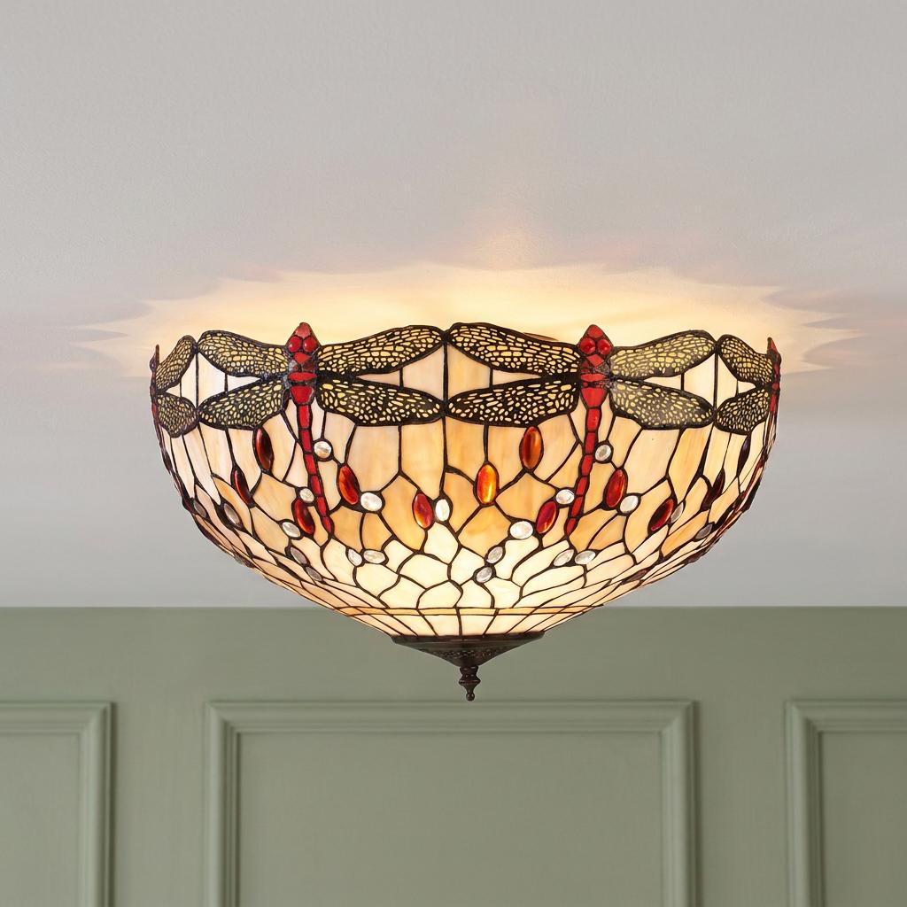 Beige Tiffany dragonfly flush ceiling light with red accents and jeweled details, mounted on a white ceiling.