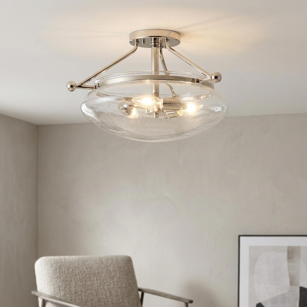Belle 3-light polished nickel semi-flush ceiling fixture with a seeded glass bowl shade, glowing in a modern room.