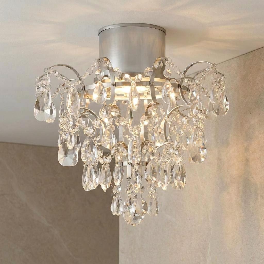 Chrome semi-flush chandelier with cascading clear crystal droplets against a light-colored ceiling.