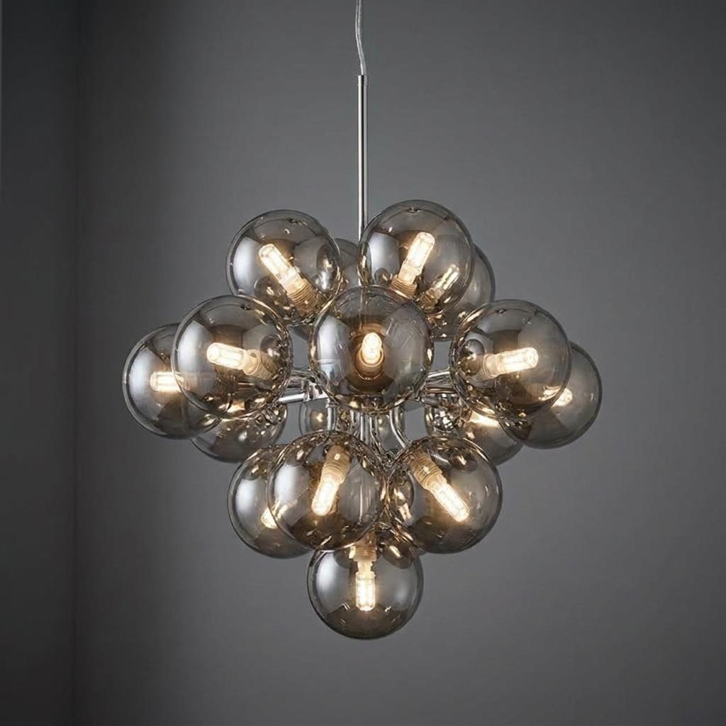Modern 17-light chrome chandelier featuring a cluster of smoked glass globes with warm glowing bulbs.