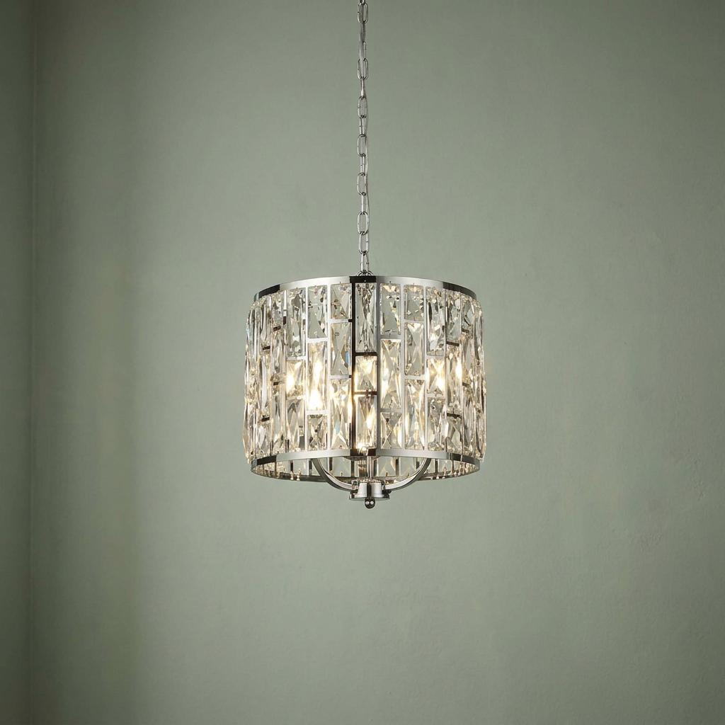 Bijou 3 light chrome ceiling pendant with crystal glass panels against a light green wall.