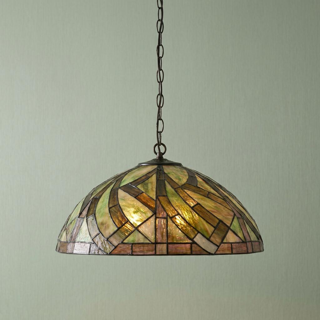 Bocastle Tiffany pendant light with an amber and green stained glass geometric shade hanging from a dark chain.