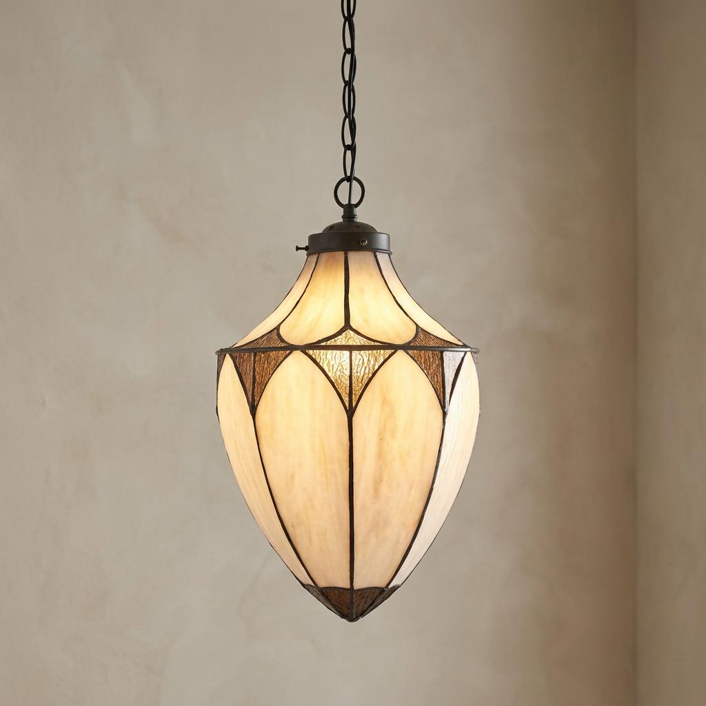 Tiffany-style acorn pendant light with cream glass panels and dark leading, illuminated against a neutral wall.