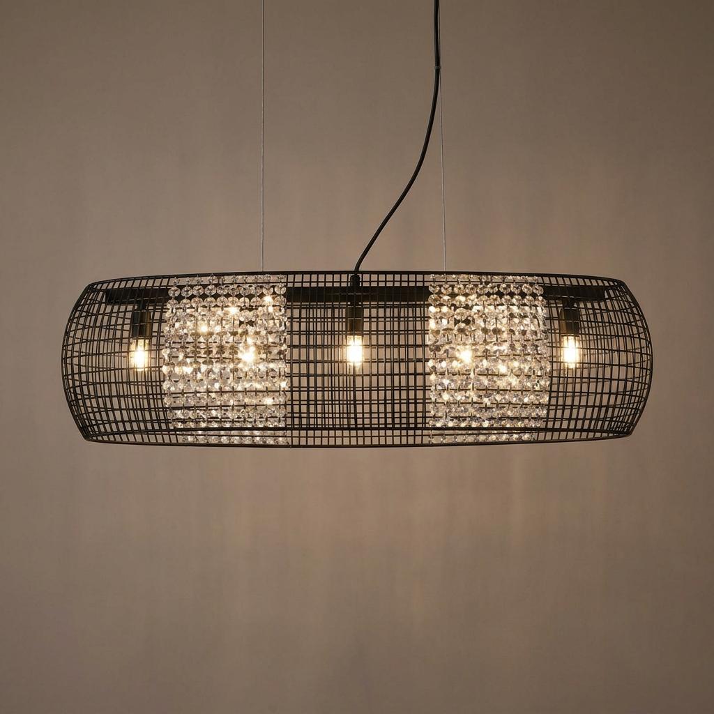 Cage 5 light black oval pendant with crystal glass panels illuminated against a neutral wall.