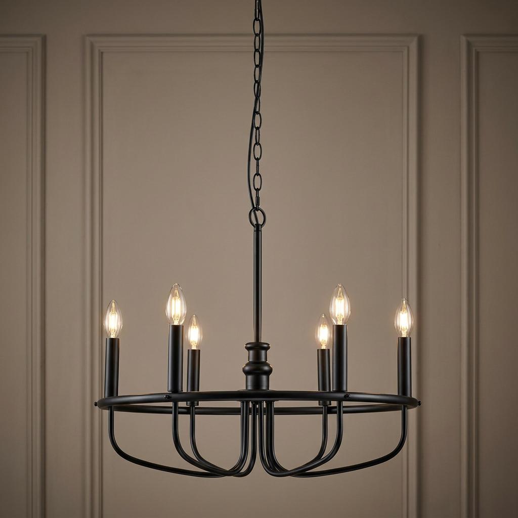 Six-light black chandelier with lit candle bulbs suspended against a neutral paneled wall.
