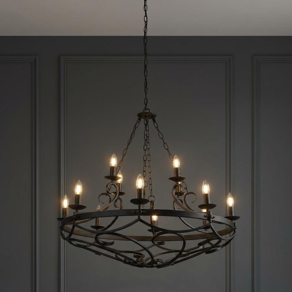 A 12-light black wrought iron cartwheel chandelier with decorative scrollwork against a grey panelled wall.