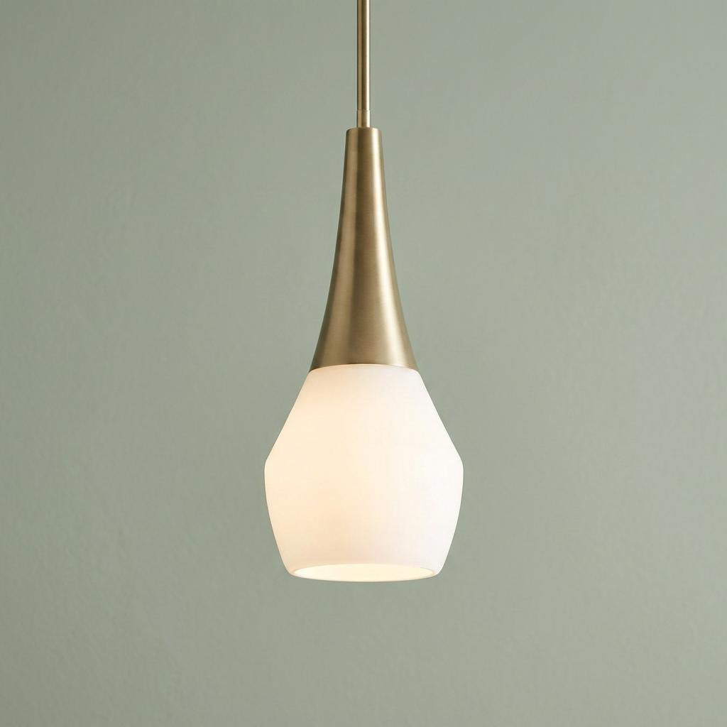 Bronze tapered pendant light with a frosted white glass shade against a sage green background.