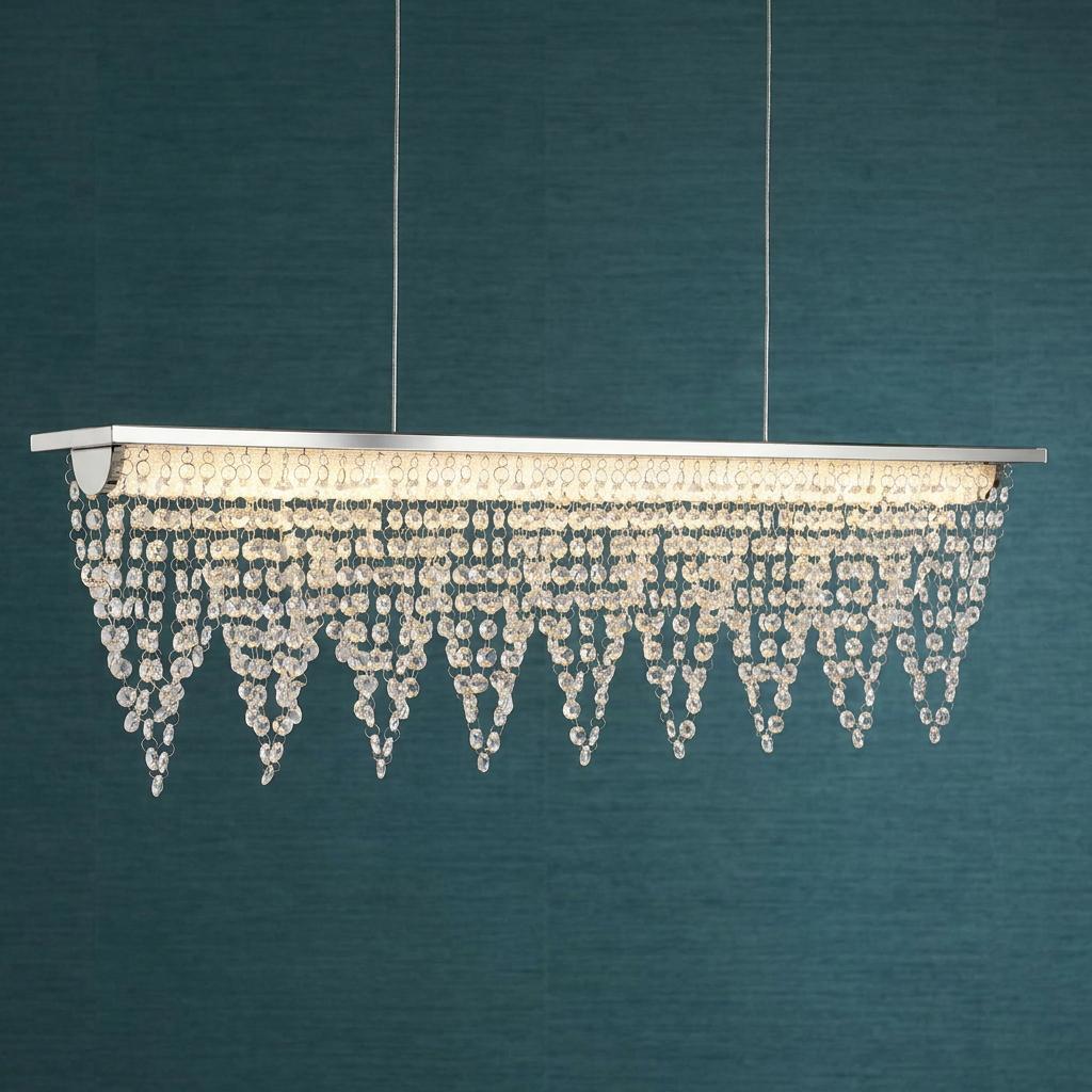 Drape LED ceiling bar light with polished chrome and cascading crystals against a dark teal background.
