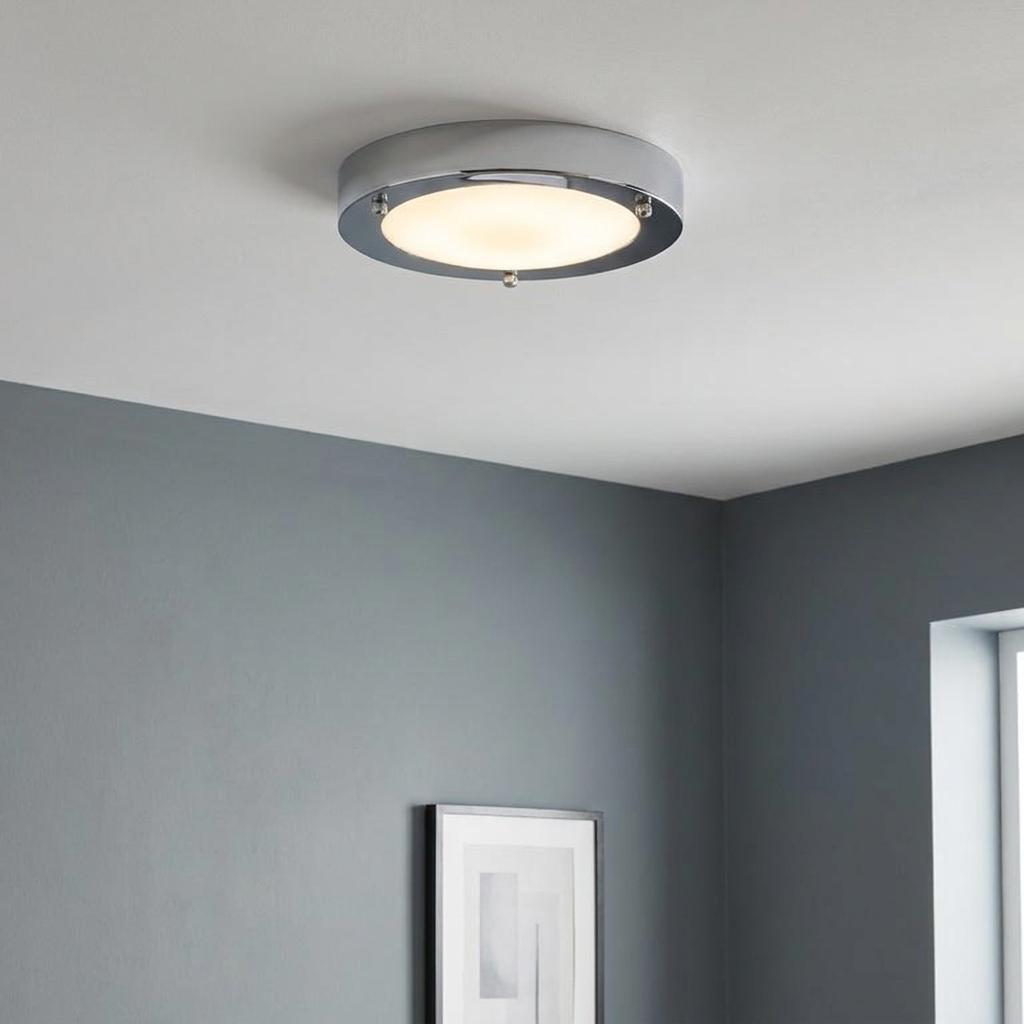 Dublin Chrome Flush Ceiling Light with frosted glass mounted on a white ceiling in a grey room.