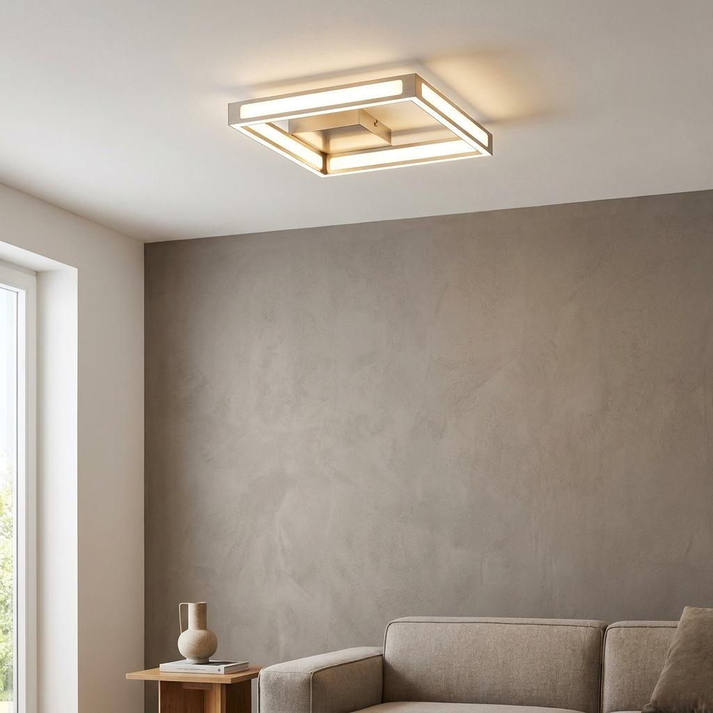 Square nickel-framed LED flush ceiling light illuminating a contemporary living room with neutral decor.