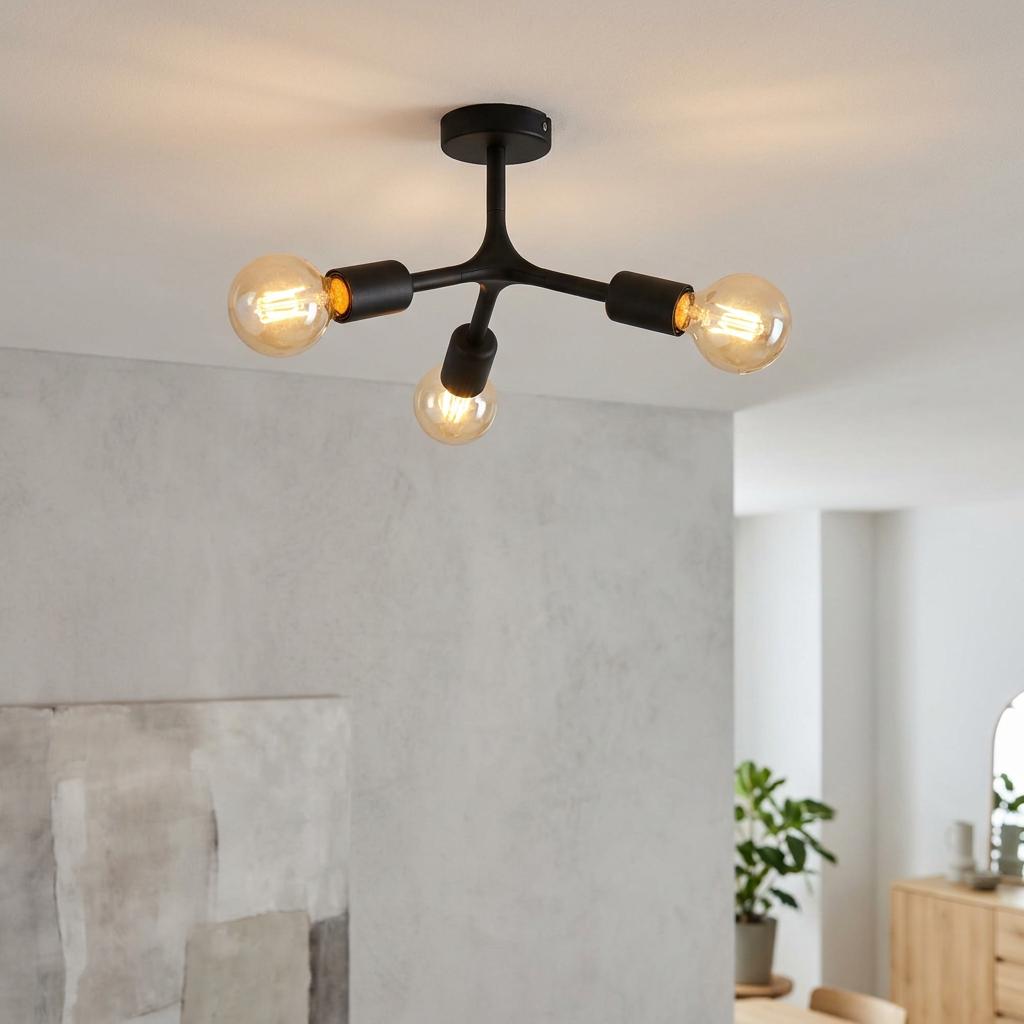 Modern Eglo Bocadella 1 matte black 3-light flush mount ceiling fixture with exposed vintage bulbs in a bright room.