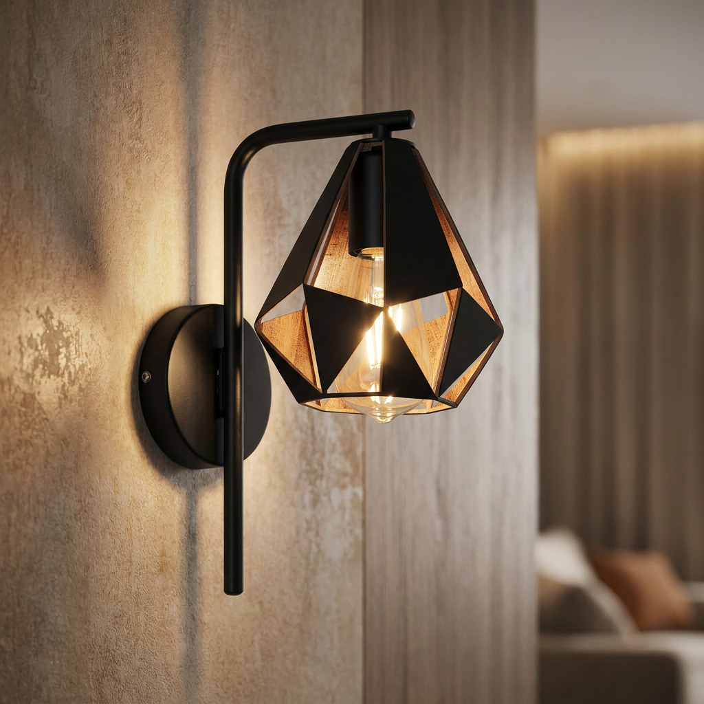Eglo Carlton 4 wall light with a black geometric shade and antique copper interior, glowing on a textured wall.
