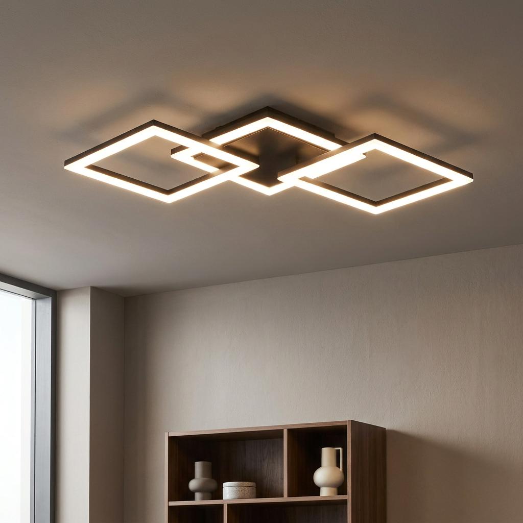 Modern black flush mount ceiling light with three overlapping glowing LED square frames.